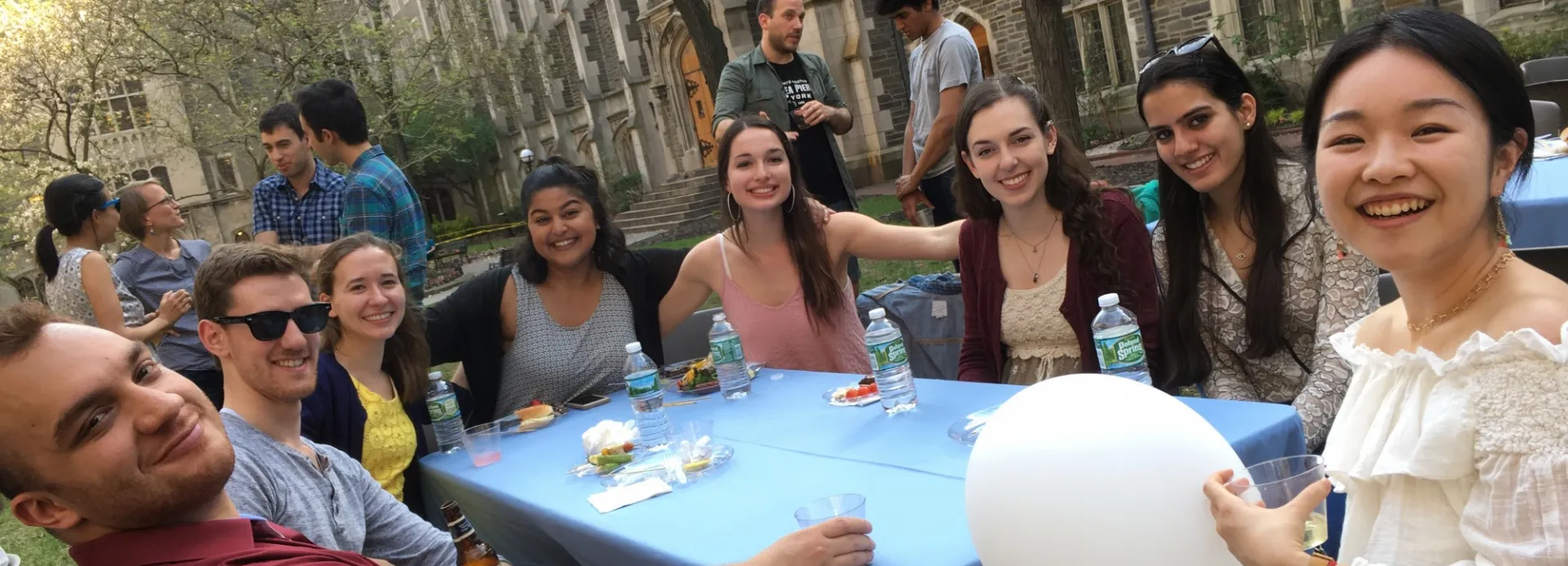Graduate students sitting at table